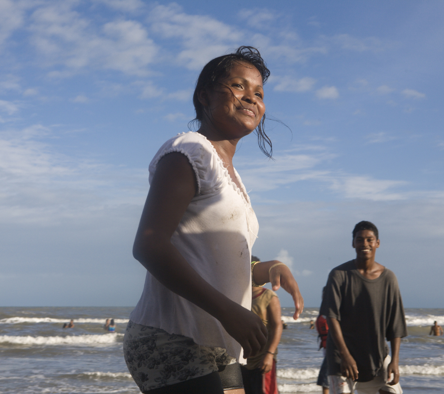 a woman stands near the shore in Nicaragua