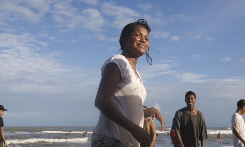 A young woman on Playa Bocana in Puerto Cabeza