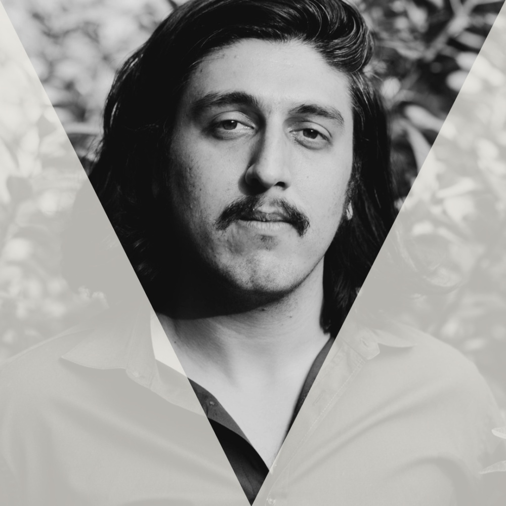 Portrait of Arash Azizzada, the co-founder and co-director of Afghans For a Better Tomorrow