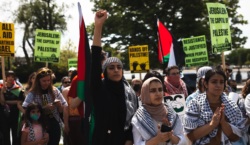Group of young men and women protesting in support of Palestine