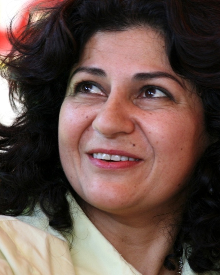 Close-up photo of Yanar Mohammed smiling